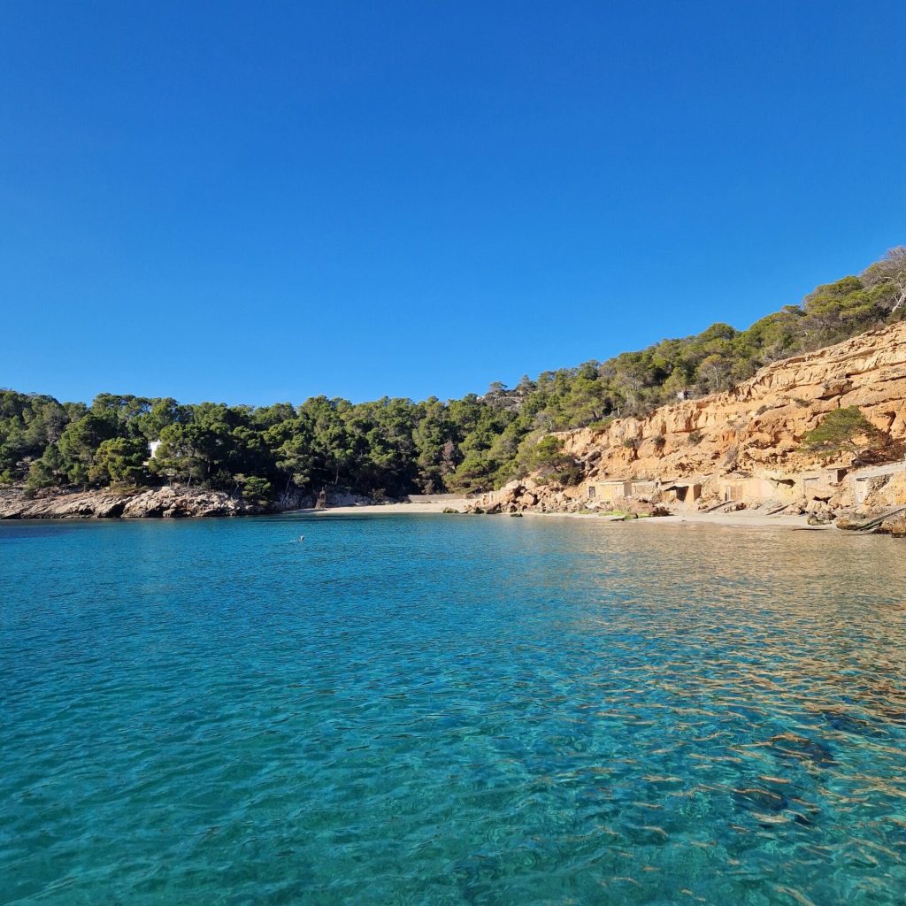 Stunning beach view in Ibiza, perfect for solo travellers and travel buddies with Life of Gini